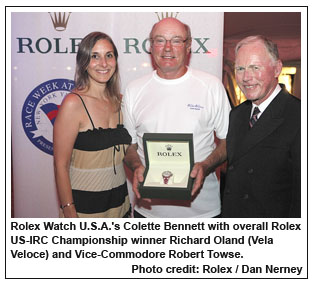 Rolex Watch U.S.A.'s Colette Bennett with overall Rolex US-IRC Championship winner Richard Oland (Vela Veloce) and Vice-Commodore Robert Towse., Photo credit: Rolex / Dan Nerney