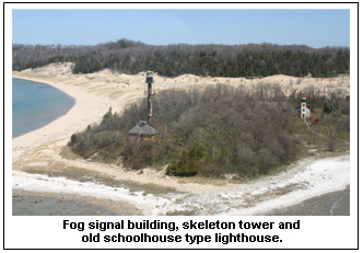 Fog signal building, skeleton tower and old schoolhouse type lighthouse