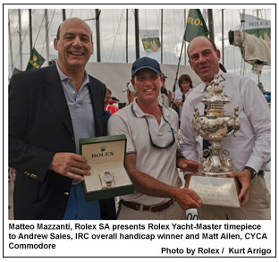 Matteo Mazzanti, Rolex SA presents Rolex Yacht-Master timepiece 
to Andrew Saies, IRC overall handicap winner and Matt Allen, CYCA 
Commodore, Photo by Rolex / Kurt Arrigo.
