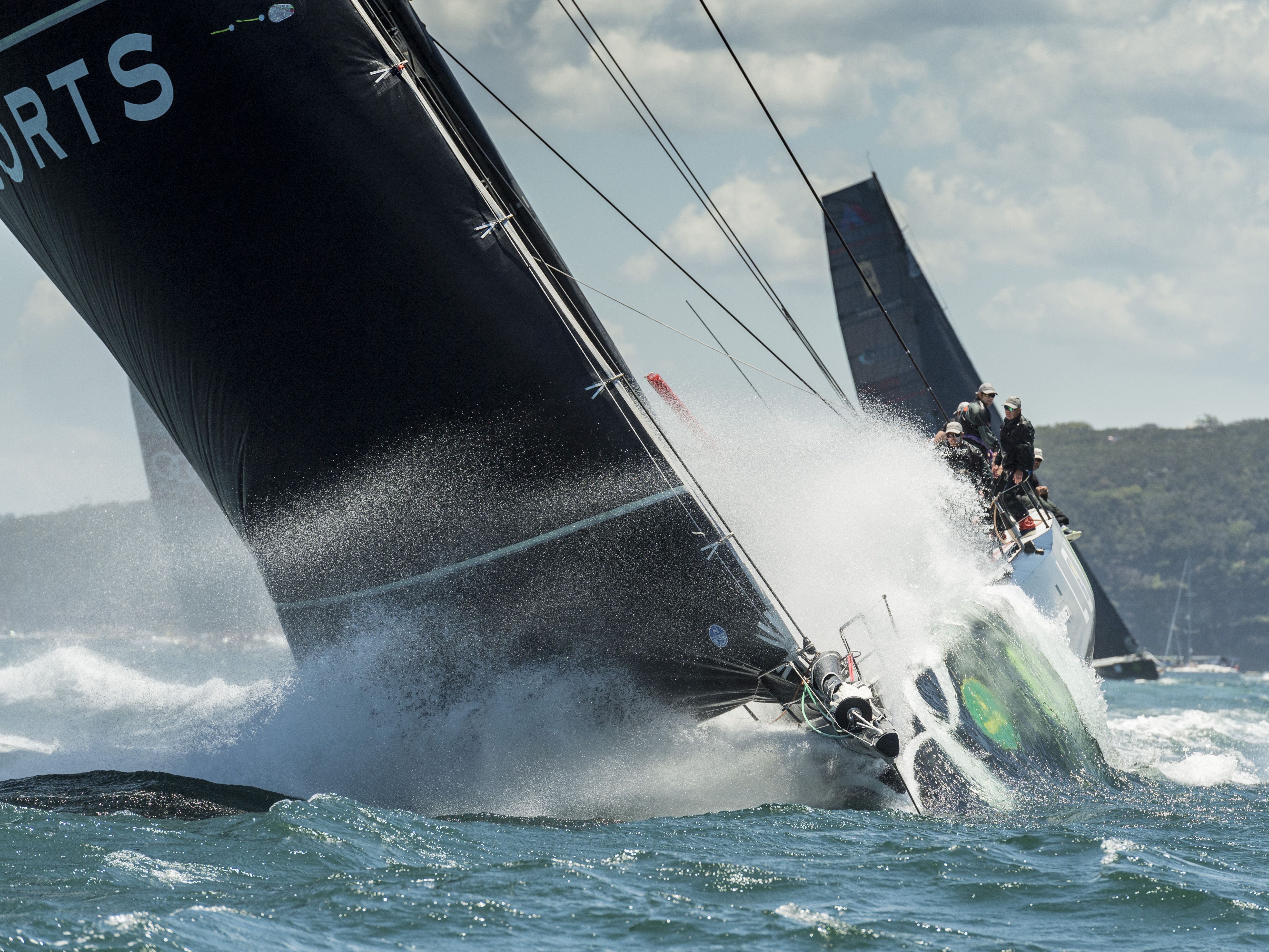 Anthony Bell's PERPETUAL LOYAL leading the 88-strong fleet at the beginning of the 2016 Rolex Sydney Hobart Yacht Race