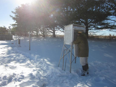 Richard G. Hendrickson, gathers weather data after a snowstorm in Bridgehampton, New York (2014).  Photo: Sara Hendrickson.