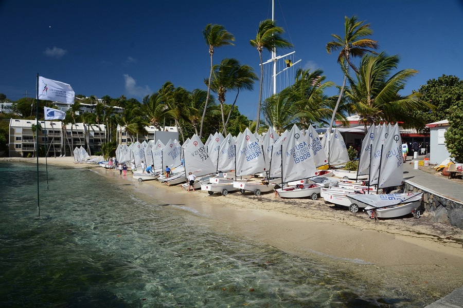 Photo: Opti’s line up on the beach at the St. Thomas Yacht Club. Credit: Dean Barnes