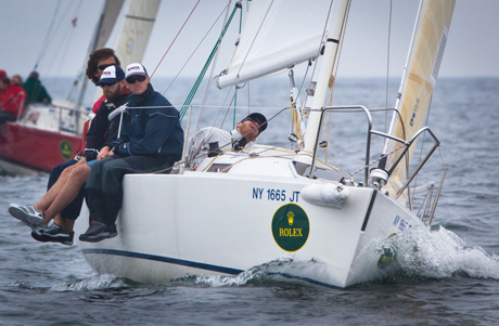 John Storck, Jr. and his J/80 Rumor team at Block Island Race Week in 2011, where they took first place in the PHRF class (Photo Credit Rolex/Daniel Forster).