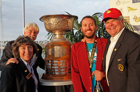 Taylor Canfield posing alongside the Congressional Cup  Photo BOB GRIESER