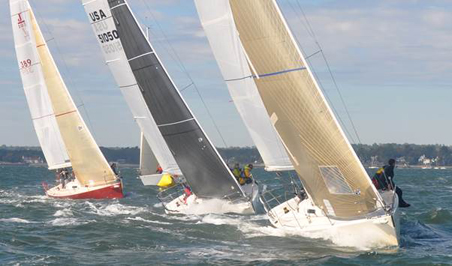 The J/105 class races upwind: (from left to right) the Bowdoin College team on Morning Glory, the Yale University team on Liquid Courage and the EDHEC team from France on Conundrum (Photo Credit McMichaelYachts.com)