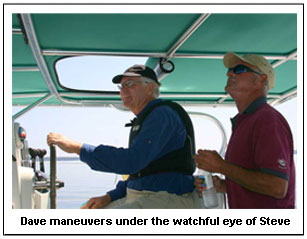 Dave maneuvers under the watchful eye of Steve