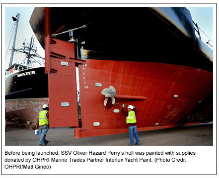 Before being launched, SSV Oliver Hazard Perry’s hull was painted with supplies donated by OHPRI Marine Trades Partner Interlux Yacht Paint. (Photo Credit OHPRI/Matt Gineo)