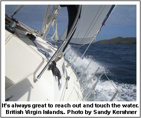 It’s always great to reach out and touch the water. British Virgin Islands.  Photo by Sandy Kershner