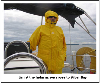 Jim at the helm as we cross to Silver Bay