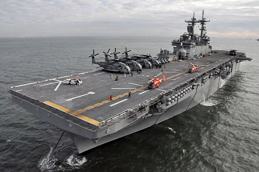 Two Coast Guard Dolphin HH-65C Helicopter's land aboard the amphibious assault ship USS Wasp (LHD 1)