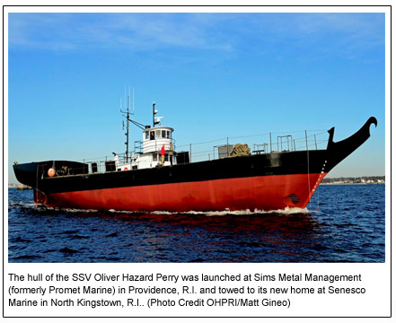 The hull of the SSV Oliver Hazard Perry was launched at Sims Metal Management (formerly Promet Marine) in Providence, R.I. and towed to its new home at Senesco Marine in North Kingstown, R.I.. (Photo Credit OHPRI/Matt Gineo)