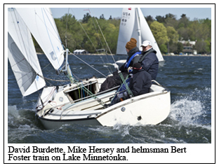 David Burdette, Mike Hersey and helmsman Bert Foster train on Lake Minnetonka