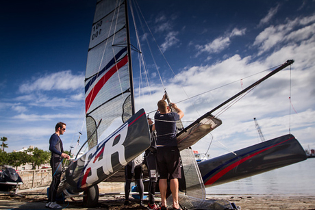 The team rig their training boat in the Royal Naval Dockyard