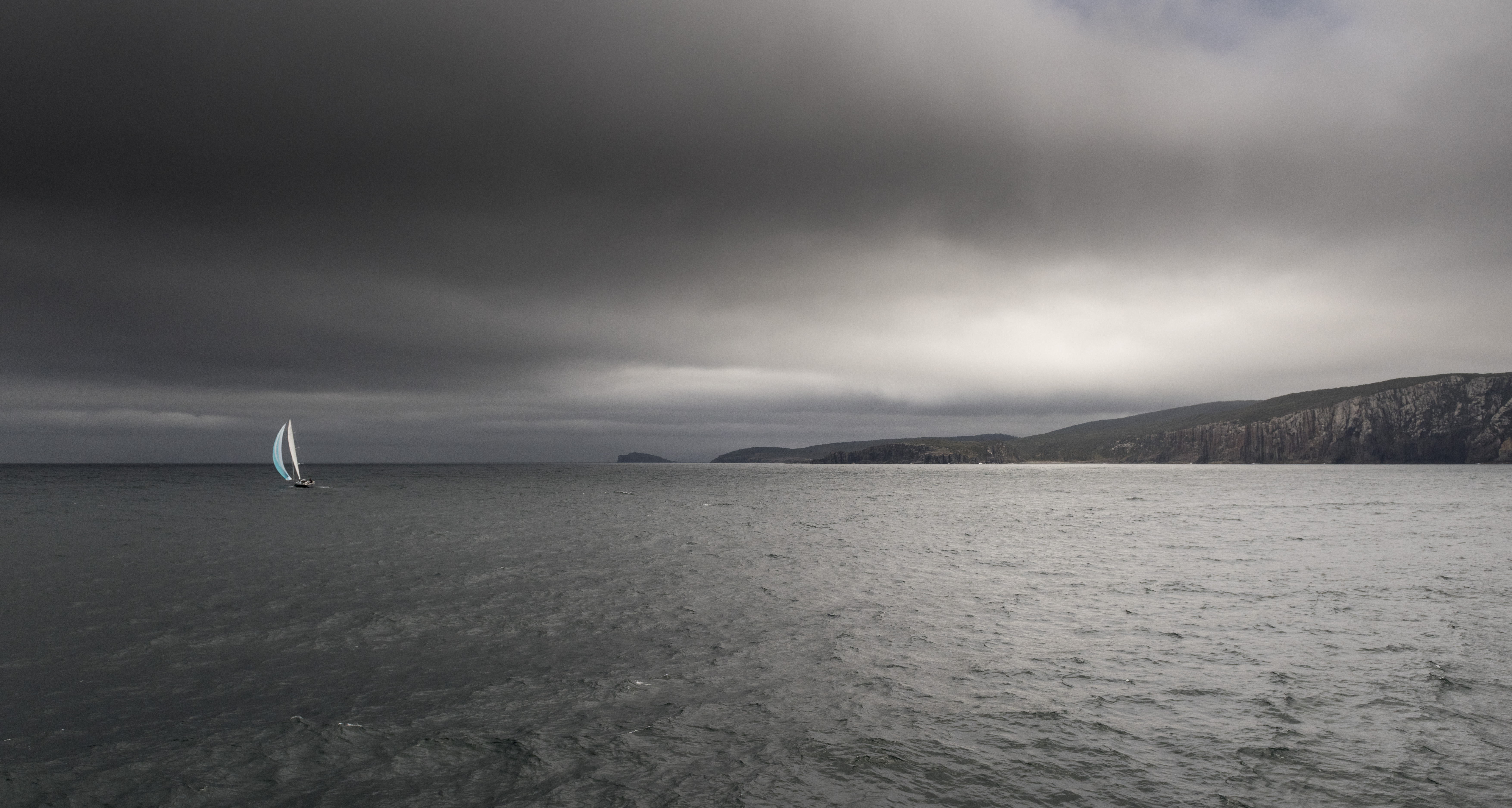 Adrian Lewis's ALLEGRO sailing off Tasmania's Cape Raoul