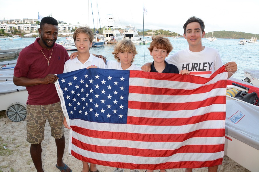 Photo: Team Spectra from the USA won the 2016 Team Race. Omari Scott (far left) will be back as coach, and Stephan Baker (third from left) and Liam OKeefe (fourth from left) will be back in 2017 to sail. Credit: Dean Barnes