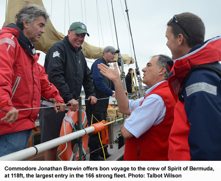 Commodore Jonathan Brewin offers bon voyage to the crew of Spirit of Bermuda, at 118ft, the largest entry in the 166 strong fleet. Photo: Talbot Wilson