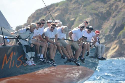 Near Miss, Switzerlands Franck Noels TP 52, races right off Great St. James island