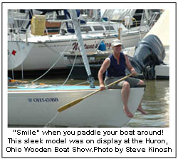 Smile when you paddle your boat around! This sleek model was on display at the Huron, Ohio Wooden Boat Show. Photo by Steve Kinosh